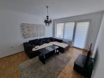 a living room with a couch and a table at Nika-Simka in Banja Luka