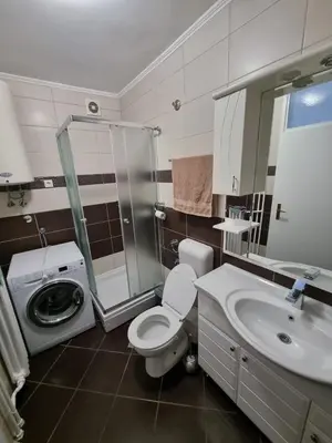 a bathroom with a toilet and a sink and a shower at Nika-Simka in Banja Luka