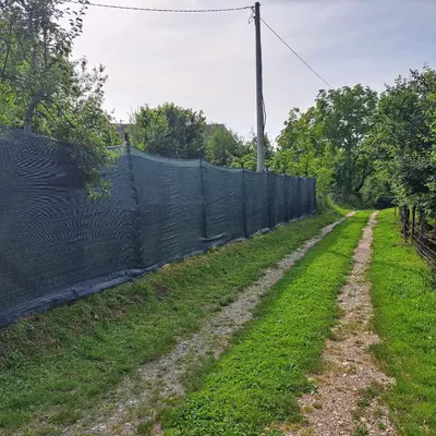 a fence on the side of a field at Oaza mira BK in Bosanska Krupa