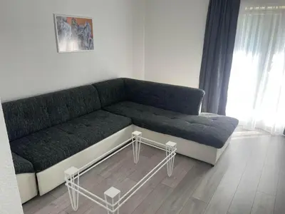 a living room with a couch in a room at Apartman BOBA in Jajce