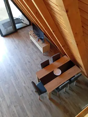 an overhead view of a dining table and chairs at Villa Rustic
