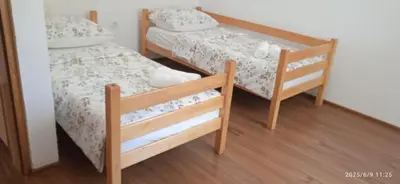 a small bedroom with two bunk beds in it at Apartman ANNA in Jajce