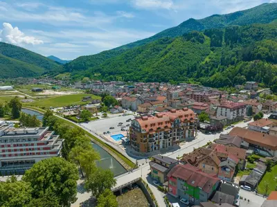 an aerial view of a town in the mountains at Apartman Suada in Fojnica