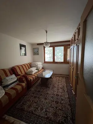 a living room with a couch and a table at Royal Travnik in Travnik