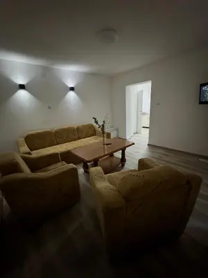 a living room with a couch and a table at Apartmani Fazinasa