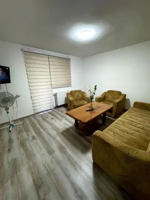 a living room with a couch and a table at Apartmani Fazinasa