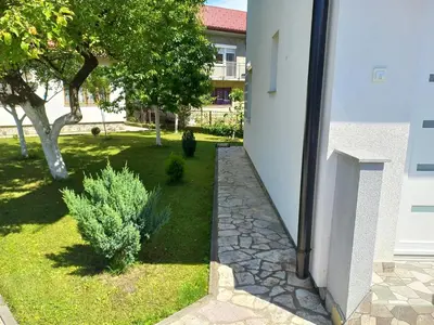 a view of a garden from the outside of a building at Ćeif HOUSE in Bihać