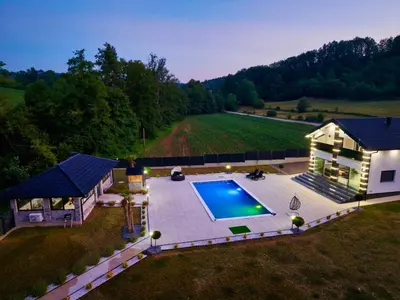 an overhead view of a backyard with a swimming pool at Villa La Casa Del Sol in Srebrenik