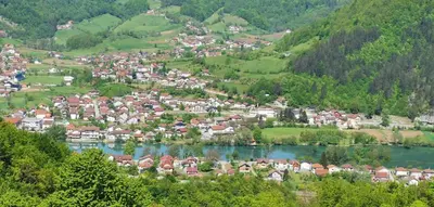 an aerial view of a town in the mountains at House Crkvina