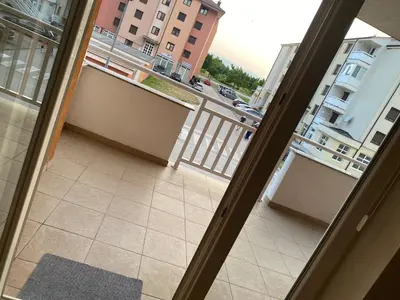an open door to a balcony with a view of a building at Apartment Boky in Livno