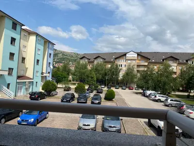 a group of cars parked in a parking lot at Apartment Boky in Livno