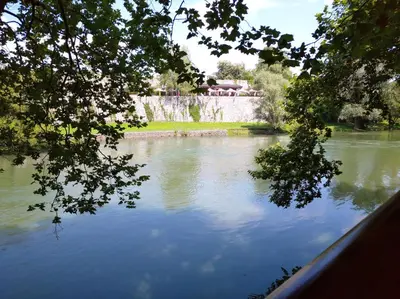 a view of a body of water with trees at Hotel Vila Vrbas in Banja Luka