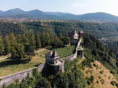 an aerial view of a castle on a hill at Apartman Serdjo