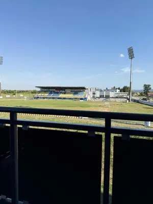 a view of a soccer field with a stadium at Bella LUX in Modriča