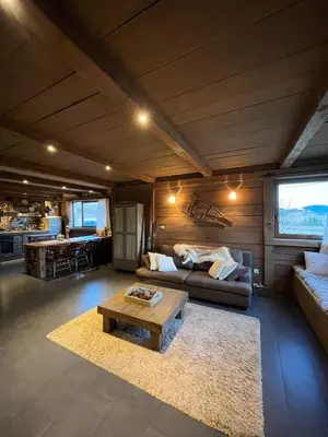 a living room with a couch and a coffee table at Runolist Kupres in Kupres