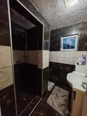 a bathroom with a shower and a sink at Apartman Nermin 2 in Travnik