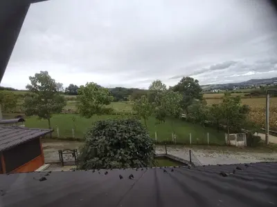 a group of birds sitting on top of a roof at Green Stay in Velika Kladuša