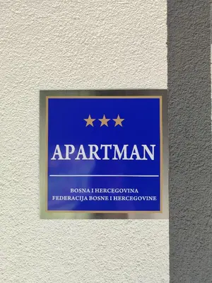 a sign that reads antiparitarian with five stars at Green Stay in Velika Kladuša