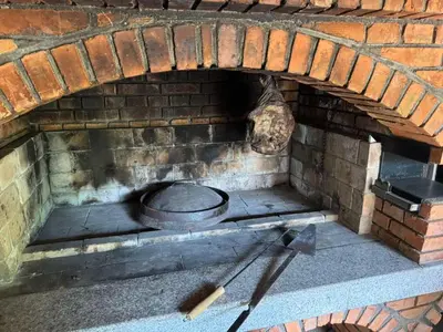 a brick oven with a pot on top of it at Villa Lavanda in Banja Luka