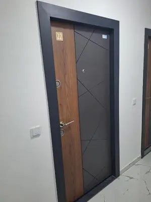 a wooden door with a sign on it at Bugojno centar in Bugojno