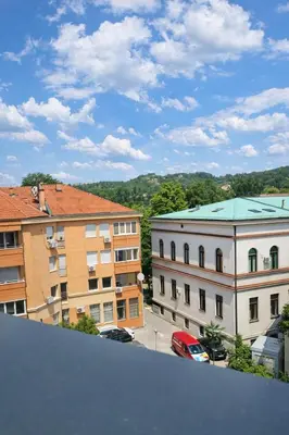 a view of a city with buildings and a street at Lana Apartmani Autor in Tuzla