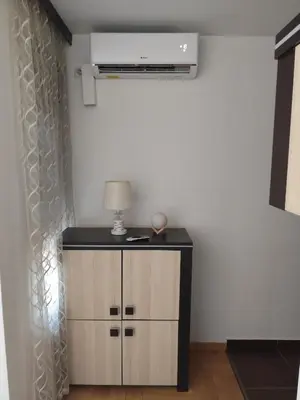 a room with a dresser with a lamp on it at AnyBL01 in Banja Luka