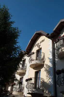 a building with balconies on the side of it at Villa Una in Bihać