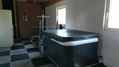 a bathroom with a sink and a window at Vikendica Brusnica