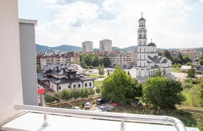 a view of a city from a balcony at Apartman Milica in Doboj