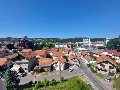 a view of a town with houses and buildings at City Vibe Apartment in Tuzla