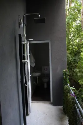 a door to a bathroom with a toilet in it at Apartman M&B - Kuća za odmor-Karanovac in Topići