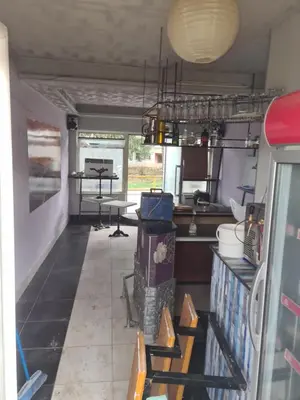 a room with a kitchen with a table in it at Durmeo in Ripač