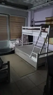 a white bunk bed sitting in a room at Durmeo in Ripač