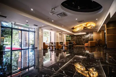 a lobby of a hotel with a glass floor at Hotel President & SPA Maglaj in Maglaj