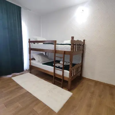 a room with two bunk beds in a room at Apartman A in Livno