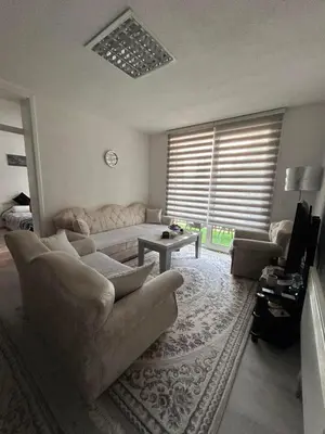 a living room with a couch and a table at Apartment Alisa in Vlasic