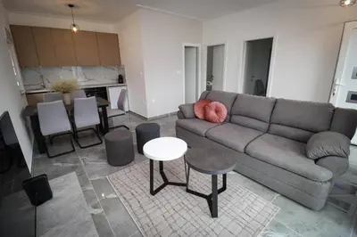 a living room with a couch and a table at Kuća za odmor Ana in Prozor