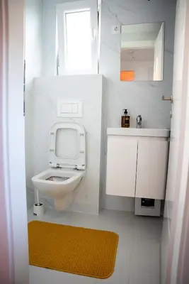a small bathroom with a toilet and a sink at Seosko Domaćinstvo Protic , Prijedor , Veliko Palančište in Velika Palančište
