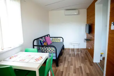 a small room with a bed and a table at Seosko Domaćinstvo Protic , Prijedor , Veliko Palančište in Velika Palančište