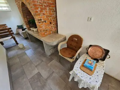 an overhead view of a room with a table and a chair at Villa Harmonija
