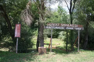 a sign for a park in the middle of a forest at Holiday home Alen in Kulen Vakuf
