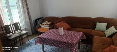 a living room with a couch and a table at Holiday home Una in Bosanska Krupa