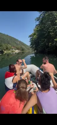 a group of people on a boat in the water at Holiday home Una in Bosanska Krupa