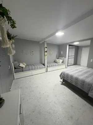 a bedroom with two beds in a room at Una Hacienda in Bihać