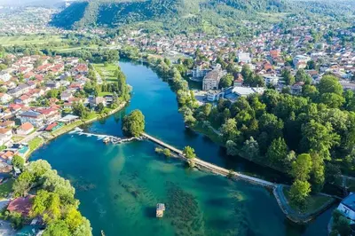 an aerial view of a river in a city at Apartman Lidija in Bihać