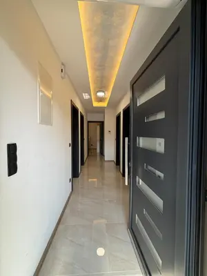 a hallway with a door and a ceiling at Villa Aurea in Bihać
