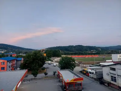 an aerial view of a town with a parking lot at Apartman Sofia Doboj in Doboj