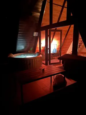 a room with a tub in the middle of a building at Villa Šašava in Bosanska Gradiška