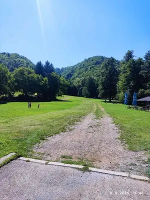 a dirt road in the middle of a field at Villa Mostanica, Kozarska Dubica