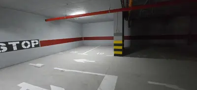 an empty room with a parking lot in a garage at Apartment Lazarus with garage Banja Luka in Banja Luka